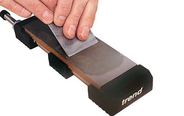 Bench stone holder for sharpening stones
