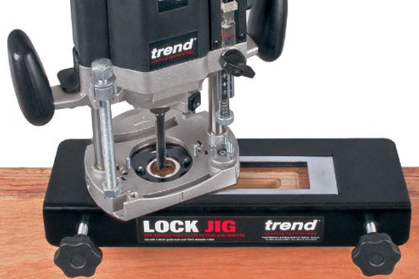 A jig for cutting mortises for locks into doors 