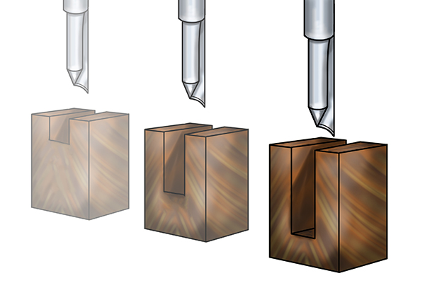 A router cutter storage tray created with a straight cutter with a central tip in a plunge router