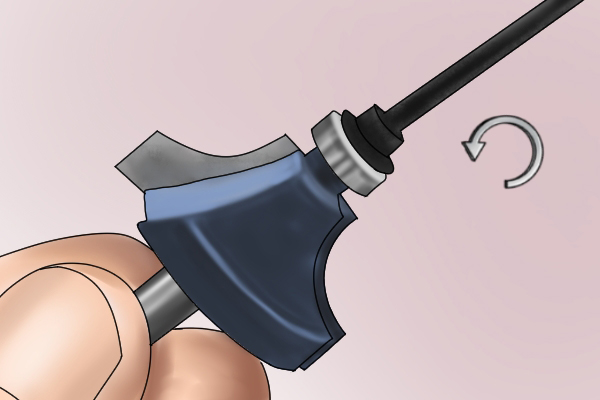 Turning the Hex Key anti-clockwise