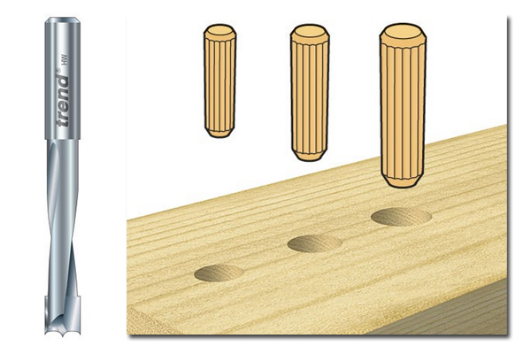 A dowel drill router cutter with examples of holes created for dowels