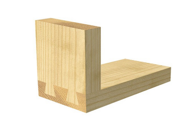 A dovetail joint in wood, with both parts of the joint shaped with a dovetail cutter