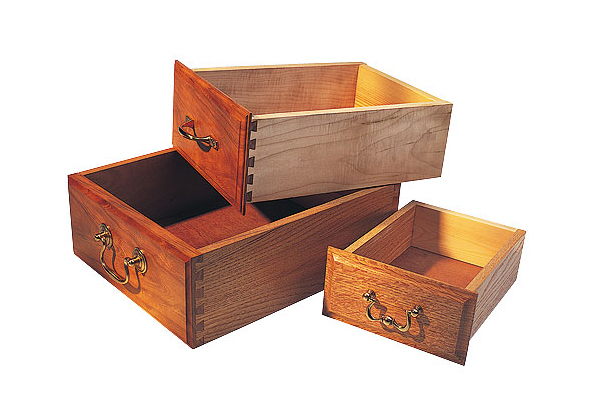 Drawers with joints created by a dovetail router cutter