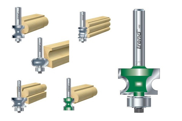 Bead and reed router cutters with examples of the shape they create on a wooden edge