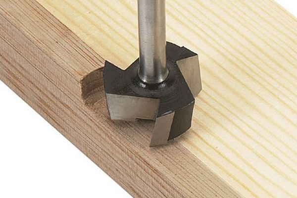 Using a flush trimmer router cutter to make two separate pieces of wood flush